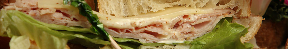 Eating Sandwich Bakery at Home Pie Bakery & Cafe restaurant in Ontario, CA.